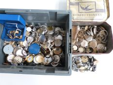 A very large quantity of pocket and wristwatch parts including gold plated cases, dials, glasses etc