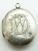 Victorian locket engraved with emblem and 'In Utrumque Paratus'
