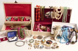 A collection of costume jewellery including beads, brooches including Hollywood, silver brooch,
