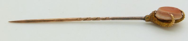 Victorian stick pin set with a cameo in a claw setting
