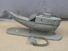 19thC or early 20thC brass or similar boat or ship on stand with steps between decks and engraved