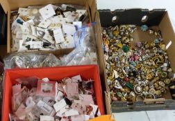 A large collection of earrings, mostly paired and sorted, including vintage examples