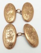 A pair of 9ct gold cufflinks with engraved decoration, Birmingham 1913, 2.9g