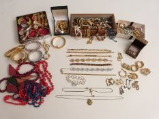 A collection of costume jewellery including watches, earrings, brooches, vintage paste necklace etc