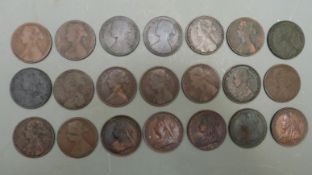 A collection of 21 Victorian pennies comprising largely young head examples to include 1860