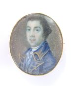 An early Victorian brooch set with a portrait miniature of a gentleman, 2.7 x 3.2cm
