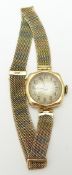 A 15ct gold watch and tri-coloured strap, 18.6g