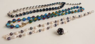 A paste necklace, glass necklace and pearl necklace