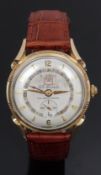 Bulova gold plated gentleman's automatic calendar wristwatch with day aperture gold hands and Arabic