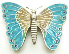 White metal and enamel buckle formed as a butterfly, marked stg silver, width 7cm
