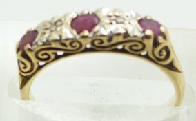 A 9ct gold ring set with rubies and diamonds, 1.8g, size K