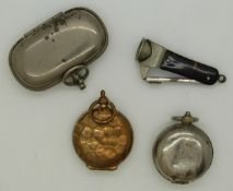 Three sovereign cases (two singles and one double) and a cigar cutter.