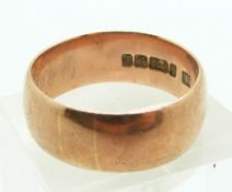A 9ct rose gold wedding band, size T, 6.8g.