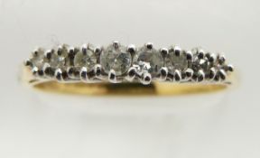 An 18ct gold ring set with eight diamonds, 3.1g, size Q