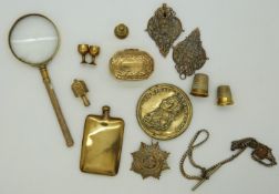 19thC miniature brass flask, snuff box with engraved lid, badges, embossed brass roundel of
