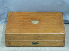 An oak canteen to accommodate 12 place settings