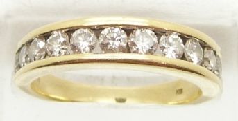 An 18ct gold half eternity ring set with twelve round brilliant cut diamonds, approximately 0.8ct