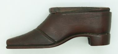 COLLECTING A 19thC wooden snuff box in the form of a shoe with studded detail, approximately 11cm