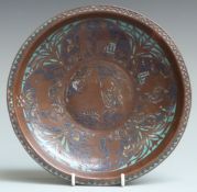 A 13thC French copper and polychrome champlevé enamel gemellion of typical shallow dished form,