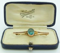 A 9ct gold brooch set with a zircon by WBS, in original Oxford box