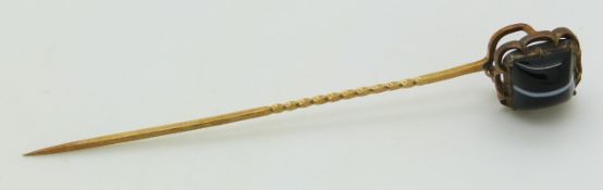 Victorian stick pin set with banded agate, length 8cm