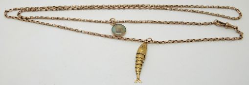 A 9ct rose gold belcher chain/fob chain with an Indian miniature charm and an articulated fish