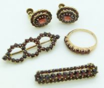 A suite of 9ct gold jewellery set with garnets, the earrings marked Czechosl