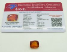A loose cushion cut orange sapphire measuring approximately 6.85ct