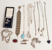 A collection of silver jewellery including Mizpah brooch, chains, pendants, silver brooch (Chester
