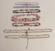 A collection of beaded necklaces including diamanté, paste, 1950s, glass etc