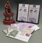 1914-1918 pennies mounted in a plinth commemorating The First World War with bronzed seated Tommy