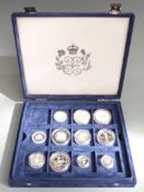 Various silver proof coins in a Westminster collector's case, to include crown sized examples, £