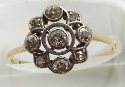 An 18ct gold ring set with diamonds, 2.1g, size P