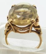 A 9ct gold ring set with paste, 5.9g, size K