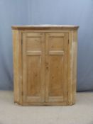 Pine hanging corner cupboard with panelled doors, H125cm