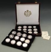 A collector's case containing 24 crown sized silver coins in honour of Her Majesty Queen Elizabeth