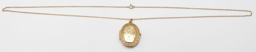 A 9ct gold locket and chain, 3.6g