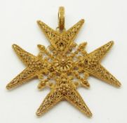 A yellow metal filigree pendant in the form of a Maltese cross, verso a small compartment, 5 x 5cm