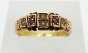 Edwardian 15ct gold ring set with rubies and seed pearls, Birmingham 1902, in heart shaped box for