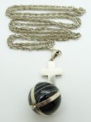 A silver cross pendant set with a large banded agate bead, on a large silver guard chain