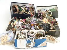 A collection of costume jewellery including beads, earrings, faux pearls etc