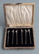 Cased set of six cocktail sticks with cockerel finials marked Sterling silver