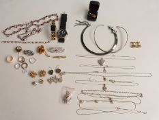 A collection of costume jewellery and some silver to include chains, necklace, rings, earrings etc