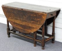 19thC oak drop leaf table with turned column frame, 118cm wide