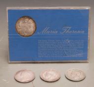 Maria Theresia cased coin together with three silver crowns 1896, 1935 and 1937
