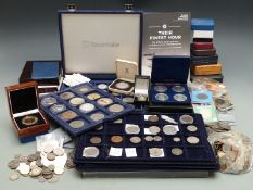 A large collection of miscellaneous cased coins, sundry coins, crowns etc, some silver content