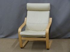 White leather or similar Ikea armchair