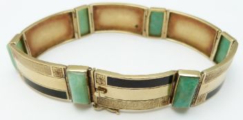 Art Deco 14ct gold bracelet set with rectangular jadeite cabochons and black enamel, 23.0g