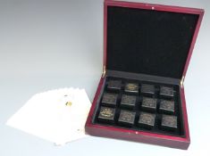 London Mint Office 'Fabula Aurum' collection comprising 12 boxed 2009 9ct gold coins, each 1g, in