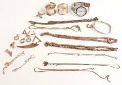 A collection of silver jewellery including bangle, pendants, earrings, chains, Accurist watch, two